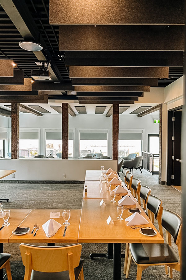 7 Oaks, our private dining and events space. Tables set for dinner with background of the room