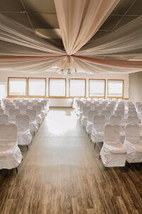 chair setup for an indoor wedding ceremoy